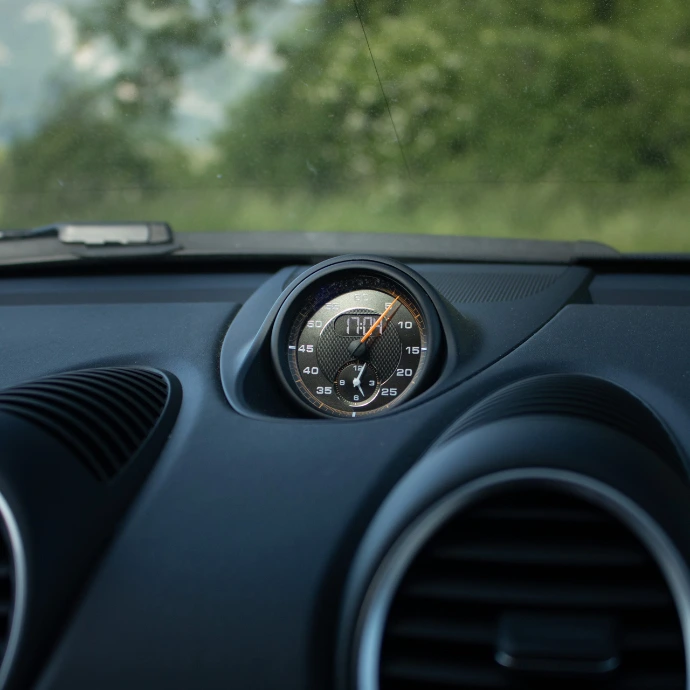 Détails intérieurs Porsche GT4 RS, matériaux légers et finitions sport. Exigence Rent Cars Suisse.